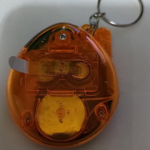Tamagotchi Connection Orange Transparent like new