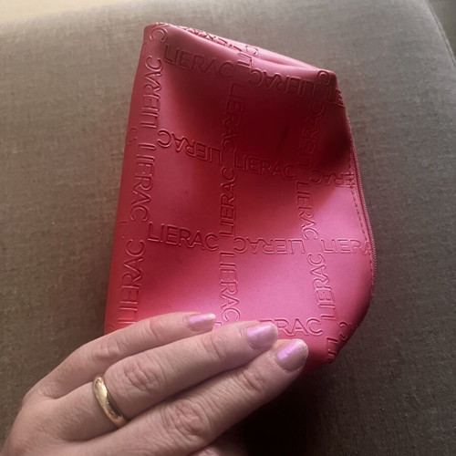 Make up bag Lierac used, pink color