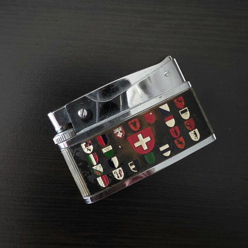 Vintage Switzerland Collectible Pocket Lighter used, fully functional