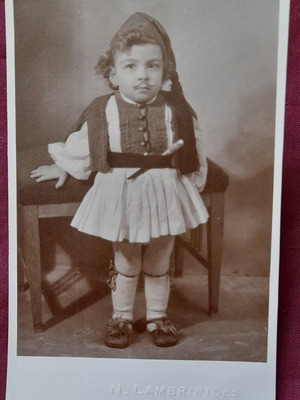 Vintage photo of boy in fustanella from Lambrinides Candie used