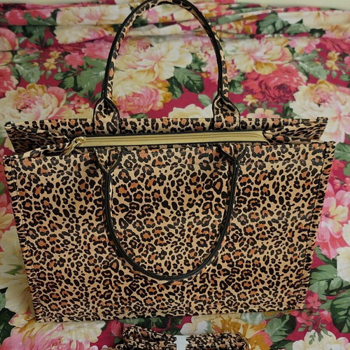 Leopard print women's handbag with strap