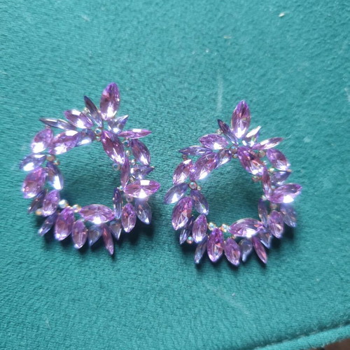 Earrings with purple stones like new