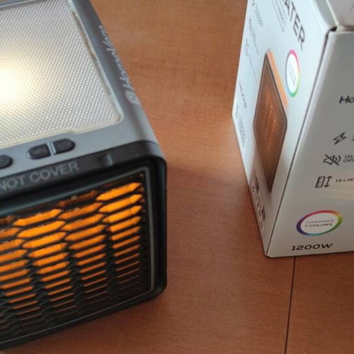 HomeVero HV-H1200 heater like new with 3 power levels and decorative light