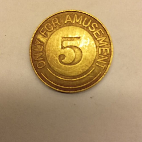 Brass amusement token used