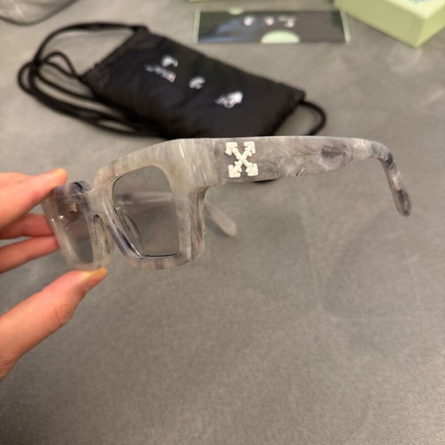 Off White marble sunglasses like new with box and case