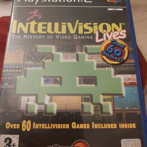 Sony PlayStation 2 console used with remote and 10 games