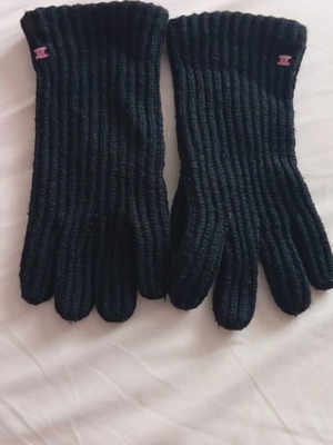 Black rib-knit gloves used with embroidered Gemini symbol