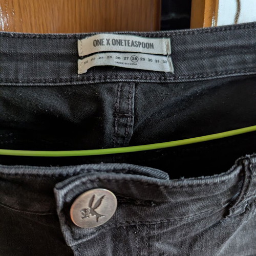 One Teaspoon Jeans size 28 like new, black with knee rip and 'bite me'