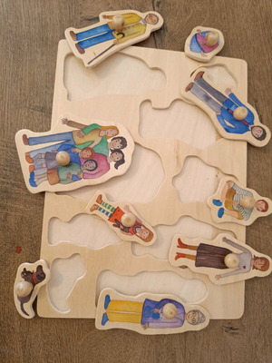 Wooden family puzzle with pegs like new