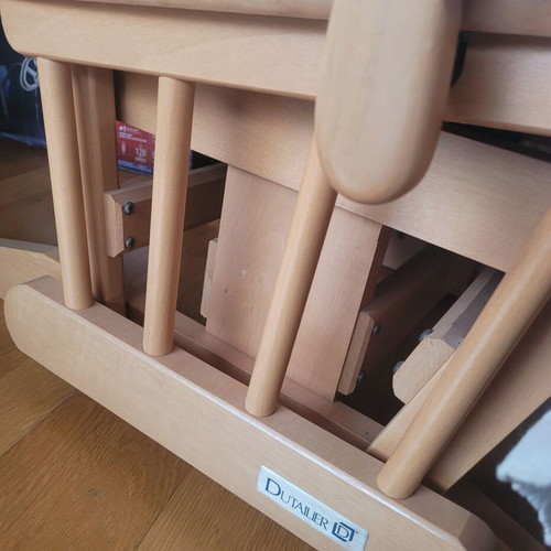 Dutailier nursing rocking chair used with footstool and throw