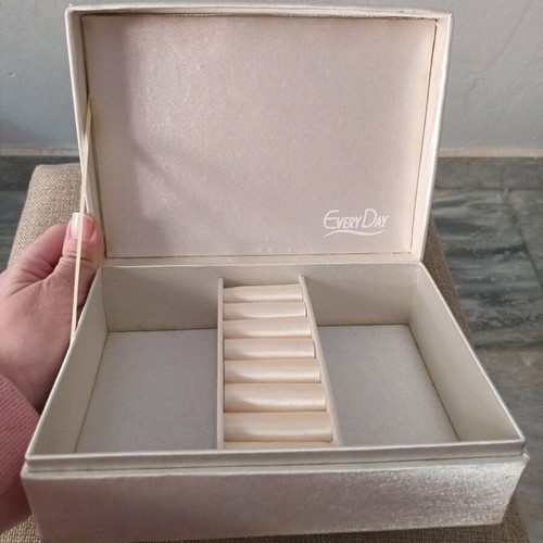 Jewelry box used, salmon color with tassel