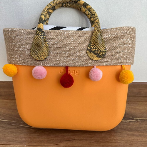 O bag handbag orange with pom-poms