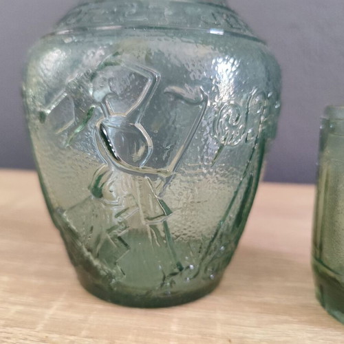 Vintage glass carafe with wine glass used