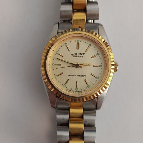 Orient women's wristwatch used, quartz, gold bracelet