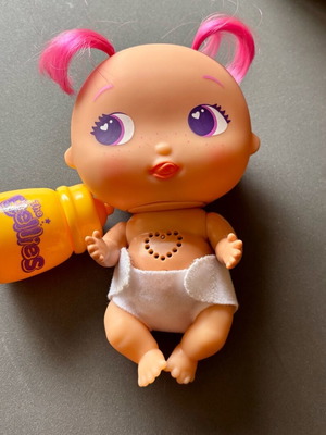 Baby doll used with bottle and various sounds