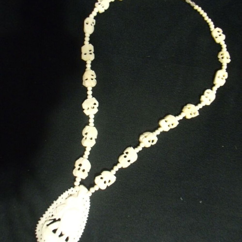 Old jewelry necklace used with white ornaments