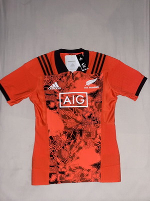Orange Rugby Jersey new with tags, size 8 medium fit