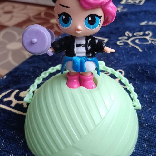 Doll figure from ball toy, black-pink hair, blue eyes
