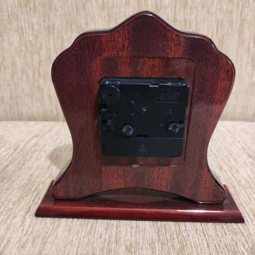 Silver table clock used with rosewood base