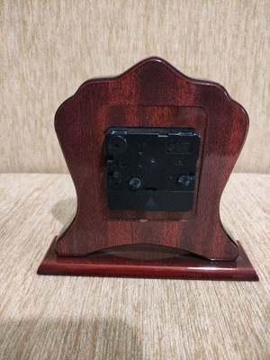 Silver table clock used with rosewood base