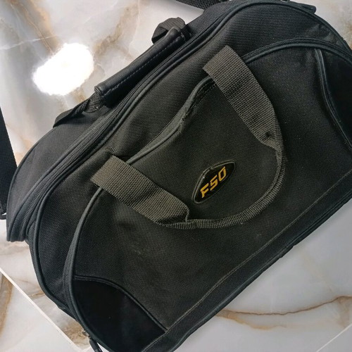 F 50 bag used, black, small with handles and shoulder strap