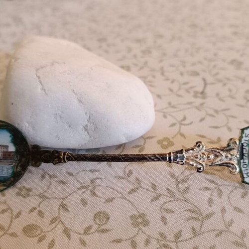 Vintage souvenir spoon from Stockholm with enamel decoration