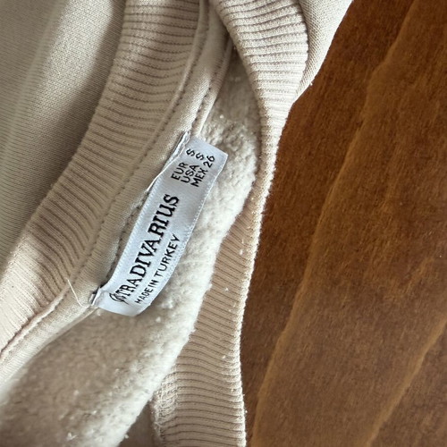 Stradivarius S white/cream sweater with Paris, like new, small black dot stain