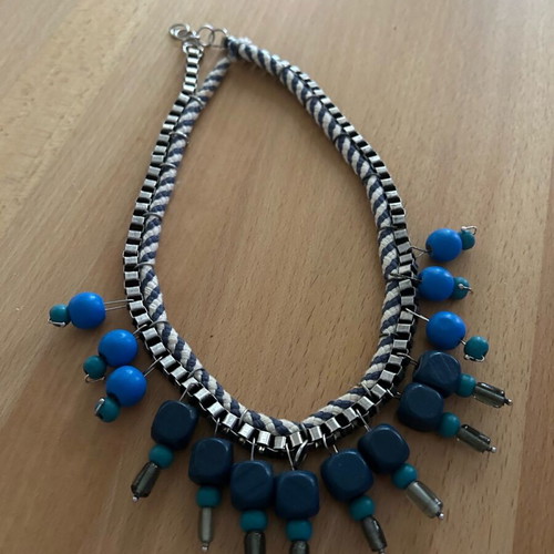 Handmade necklace used with chain, striped cord and wooden beads