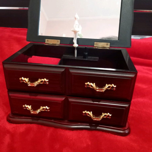 Vintage jewelry music box used with dancing ballerina