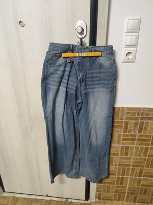 Women's straight-leg denim jeans, light blue with faded details, casual style