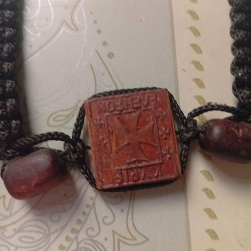 Christian bracelet with carved wood used