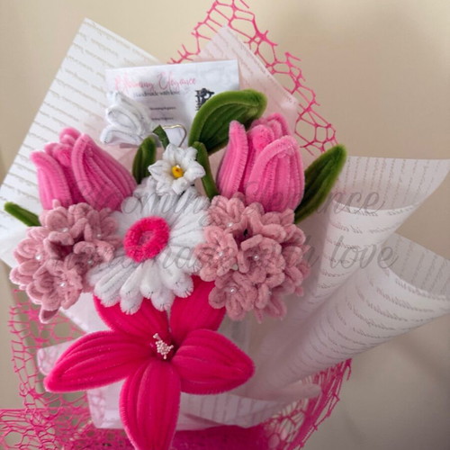 Delicate pink bouquet of tulips, lilies and gerbera custom made
