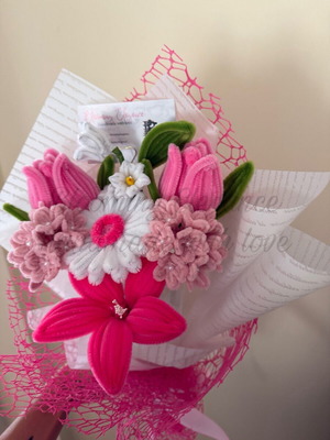 Delicate pink bouquet of tulips, lilies and gerbera custom made