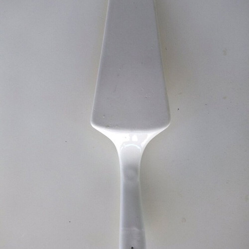 Ceramic serving platter with matching spatula, fruit design