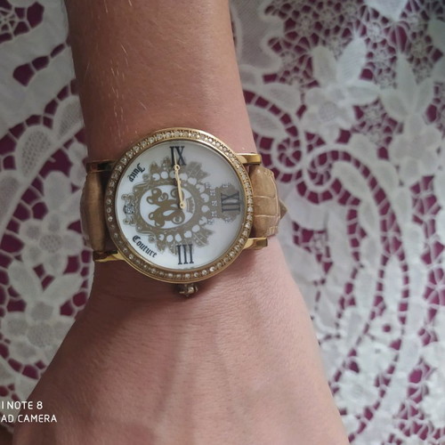 Juicy Couture watch like new with leather strap women's