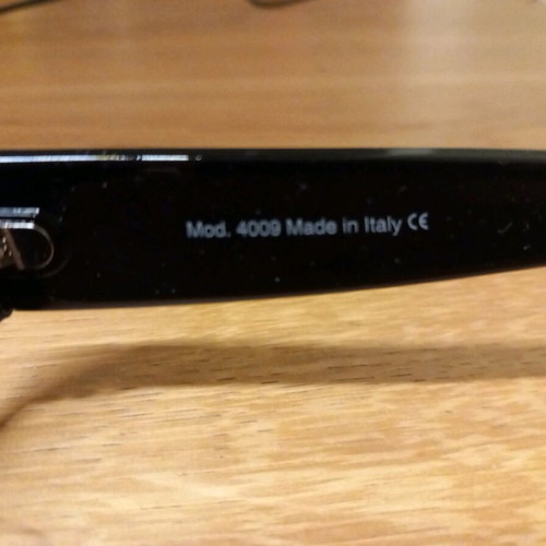 Black sunglasses in modern design new, Made in Italy