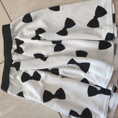 Girl's skirt with bows like new, size 12 years, black and white