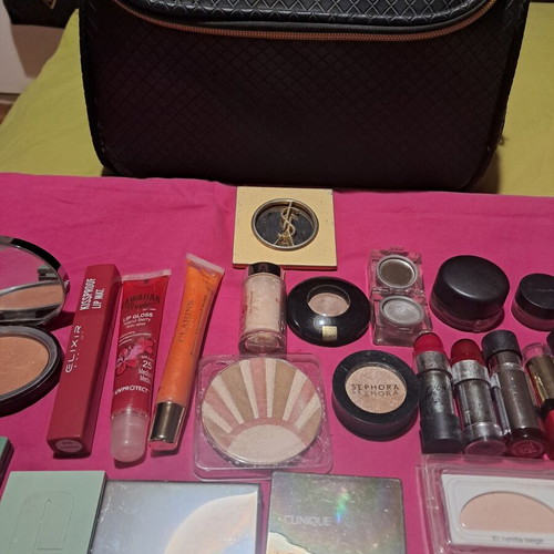 Large collection of branded cosmetics with YSL mirror and makeup bag