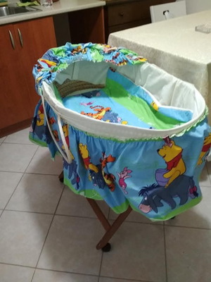 Bassinet with wooden base used
