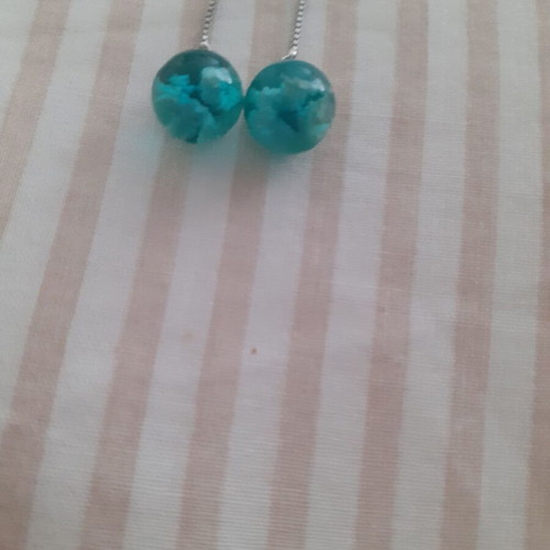 Dangling earrings new with blue sky design made of resin