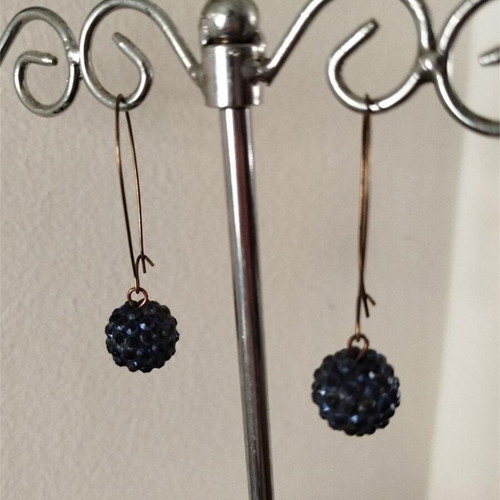 Earrings used with blue crystal balls
