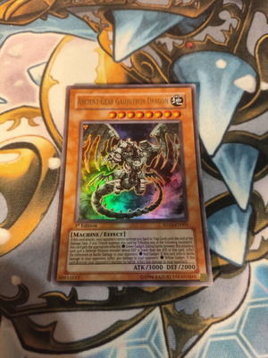 Ancient Gear Gadjiltron Dragon Yu-Gi-Oh! card used, damaged