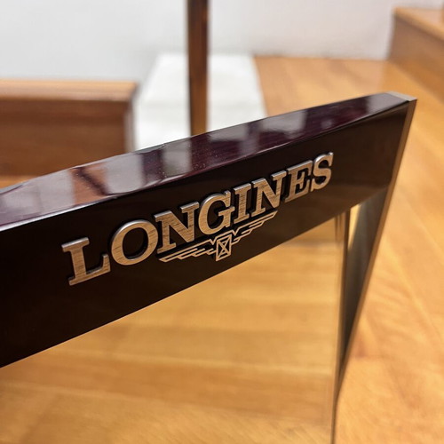 Longines mirror used with minor paint wear, wooden frame