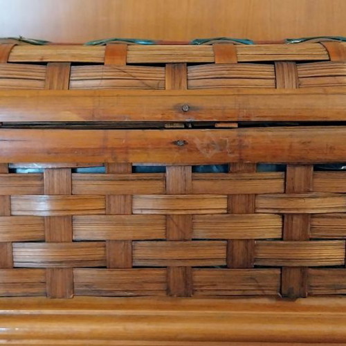 Woven wicker drink holder used with decorative pattern