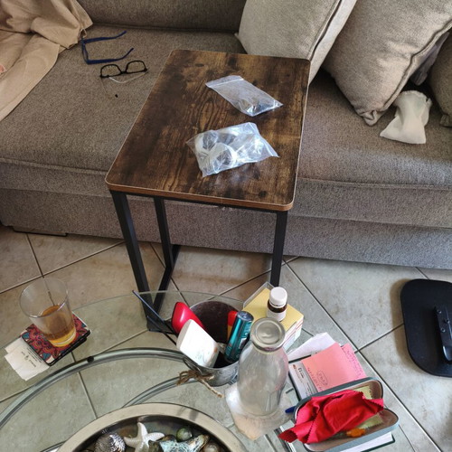 Wooden side table with metal base and wheels