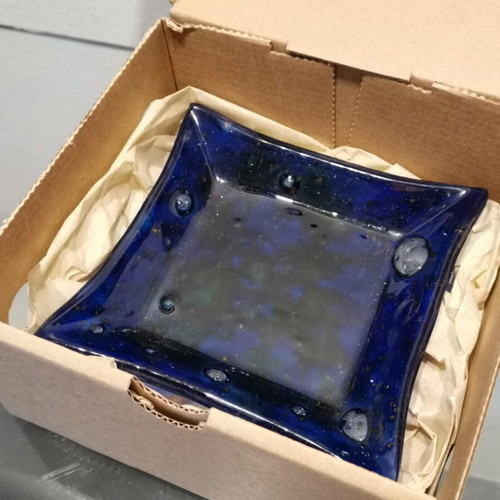 Decorative plate used, blown glass blue with green and yellow elements