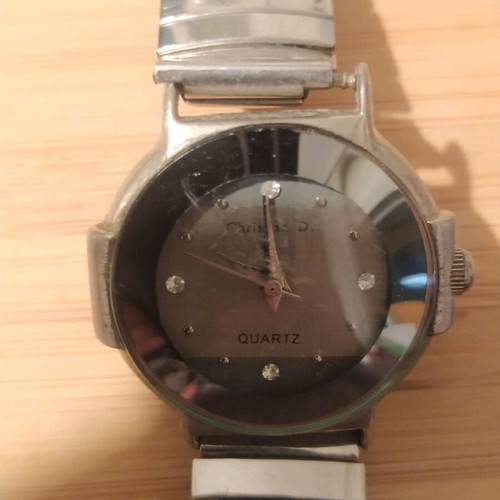 Women's watch used with elastic grey silver bracelet
