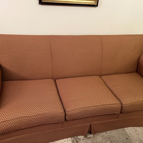 Three-seater sofa used with wooden frame and classic design