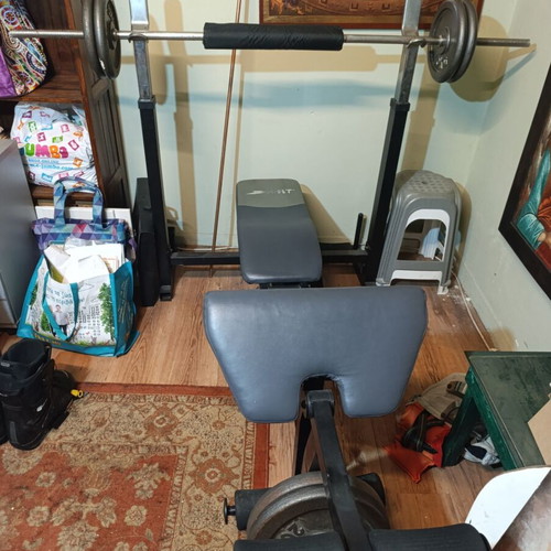 Weight bench with bar and weights used, iron