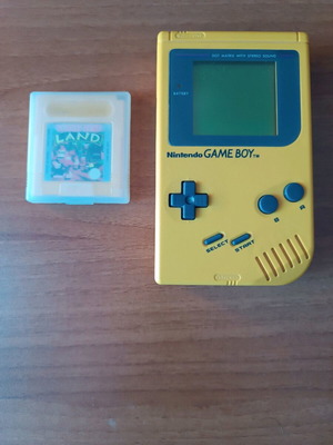 Game Boy yellow with Donkey Kong Land used